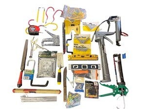 lot 143 image: Assorted Hand Tools and Hardware Collection with Levels, Saws, Brackets, and Caulking Guns