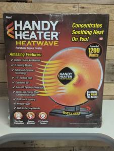 lot 54 image: HANDY HEATER 1200-Watt Electric Ceramic Parabolic Space Heater