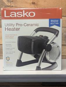 lot 113 image: Lasko 1500W Electric Pivoting Utility Ceramic Space Heater with Thermostat, 5919, Black