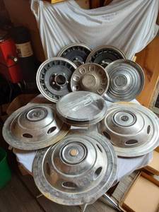 lot 27 image: Lot of Vintage Hubcaps, Including Ford and Plymouth