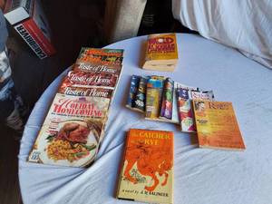 lot 60 image: The Catcher in the Rye by J.D. Salinger, Good Housekeeping, Taste of Home, Readers Digest, and The World Almanac 1982
