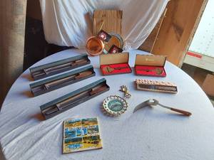 lot 66 image: Kitchen and Souvenir Items including Vintage Yellowstone Park Tile, Houston Astrodome Plate, and Copral Cookware