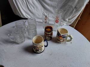 lot 81 image: Drinkware Items including Enesco Mug, Artmark Mug, and Schmidt Beer Glass