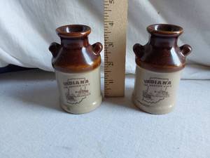 lot 93 image: Pair of Indiana Themed Salt and Pepper Shakers
