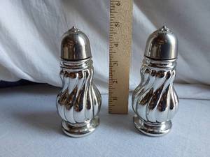 lot 94 image: Avon Silver Swirl Salt Shaker Sweet Honesty Cologne