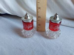 lot 128 image: Pair of Las Vegas Souvenir Glass Salt and Pepper Shakers with Metal Lids