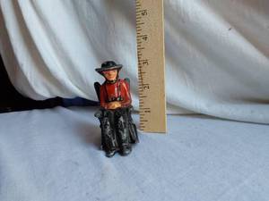 lot 137 image: Wilton () Cast Iron Amish Figurine and Chair