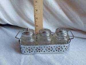 lot 140 image: Glass Salt and Pepper Shaker Set with Metal Carrier
