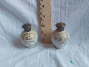lot 211 image: 50th Anniversary Salt and Pepper Shakers with Gold Accents