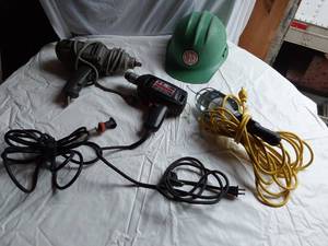 lot 263 image: Black & Decker Bulldog Impact Wrench, Craftsman Drill, Extension Cords, Work Light, and Hard Hat