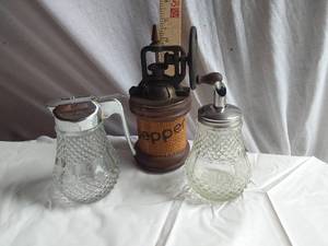 lot 317 image: Vintage glass syrup dispensers and pepper grinder