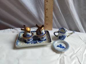 lot 321 image: Delft Blue Windmill-Themed Ceramic Salt and Pepper Shakers and Mini Pitcher and Saucer