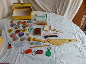 lot 411 image: Vintage Promotional Items including Badges, Keychains, and Tools - Dairy Queen, Polka Fest, Popcrorn Days, Trojan