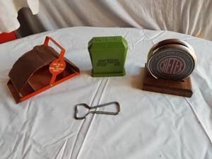 lot 414 image: Grain Belt Beer Bottle Opener, Brown & Williamson Cig Roller, CRI-TEX 75th Anniversary Item, and Salt and Pepper Shaker