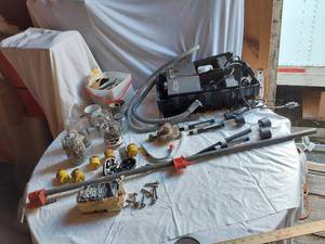 lot 429 image: GE Crystal Clear 200 Watt Bulbs, Assorted Plugs, Timers (untested), Solar Lights and Bolts