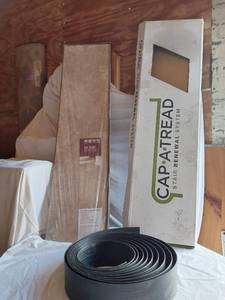lot 439 image: Cap-A-Tread Stair Renewal System and 8mm Travertine Tile Gray Laminate Flooring