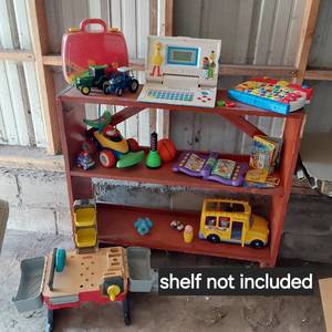lot 475 image: Fisher-Price and VTech Toys including Sesame Street Talking Computer, Alphabet Learning Board, Toy Vehicles - shelf not included