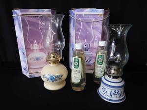 lot 110 image: NEW AND NEARLY NEW OIL LAMPS