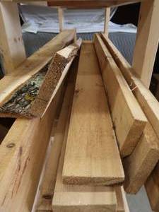 lot 0W image: LOT OF CEDAR ROUGH CUT LUMBER.