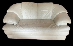 lot 20 image: White Leather Loveseat Sofa with Padded Arms
