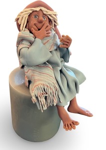 lot 109 image: Handcrafted Clay Figure in Pajamas with Scarf and Cap on Candle