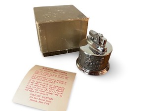 lot 113 image: Vintage Table Lighter with Embossed Metal Design and Box