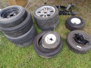 lot 98 image: Rim with Tires -Pile of 10