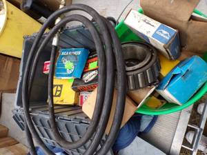 lot 110 image: Bearings in Box, Hydraulic Hose, Green Bucket