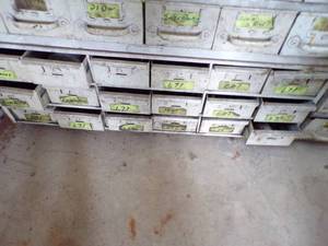 lot 256 image: By Wall 4th Down Bottom- white medal bolt Bin with content -18 drawers