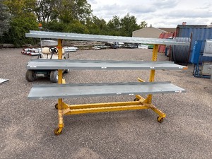 lot 53 image: Mobile 3-level cantilever double sided rack 120 l. x 48 w x 68  t