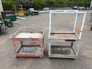 lot 75 image: (2) rolling carts Orange Rubbermaid commercial and Rubbermaid service cart with metal stand on top