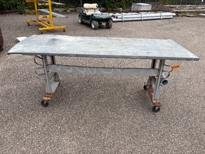 lot 60 image: Metal Rolling work table 96l x 36 w x 39  t