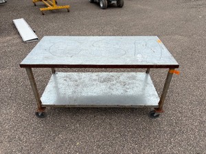 lot 64 image: Metal rolling work table 60  l x 30 w x 32 