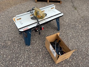 lot 45 image: Ryobi Router Table, A25RT02, 32 x 16 x 1 Laminated MDF table top