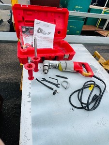 lot 14 image: Milwaukee heavy duty right angle  D-Handle drill, Cat. no. 1101-1 Powers up