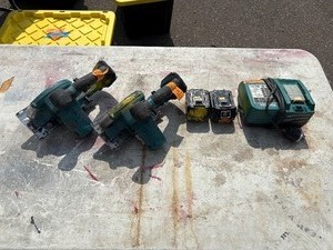 lot 167 image: (2) Makita XSC01 handheld circular saws with 2 18V 3.0 AH batteries & a DC18RA charger
