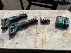 lot 184 image: (2) Makita handheld sawzals XRJ0 and BJR182  Reciprocating Sawzal with (2) 18V  3.0 AH batteries & a DC18RC charger