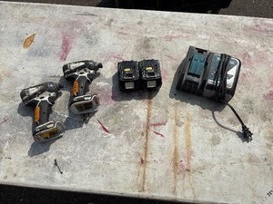 lot 191 image: (2) Makita impact drivers LXDT04 with (2) 18V batteries & a DC18RC charger
