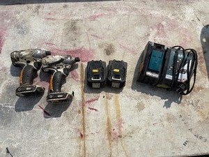 lot 193 image: (2) Makita impact drivers LXDT04 with (2) 18V batteries & a DC18RC charger