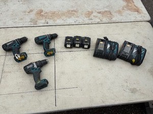 lot 220 image: (3) Makita rotary hammer driver drills XPH01, LXPH01, XPH12 Includes two chargers three 18V batteries