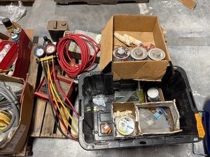 lot 277 image: Pallet plumbing, electric, & primer Yellow Jacket Gauge Cone Nuts Shark Bite Max EMT straps Rollers