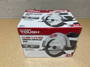 lot 218 image: Hyper Tough 12 Amp Corded 7-14 inch Circular Saw with Steel Plate Shoe, Adjustable Bevel, Blade & Rip Fence