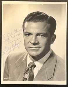 lot 7 image: Signed Black and White Photo of Dan Andrews, Personalized to Lester Glassner