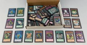 lot 10 image: Misc. Unsorted Yu-Gi-Oh Trading Cards (All In Protective Sleeves)
