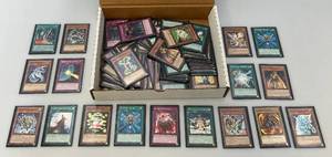 lot 12 image: Misc. Unsorted Yu-Gi-Oh Trading Cards (All In Protective Sleeves)