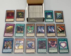 lot 13 image: Misc. Unsorted Yu-Gi-Oh Trading Cards (All In Protective Sleeves)
