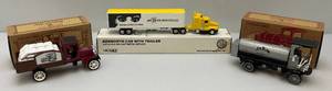 lot 19 image: Misc. Ertl Die-Cast Jim Beam Collectible Miniature Vehicles (NIB) Some Are Banks