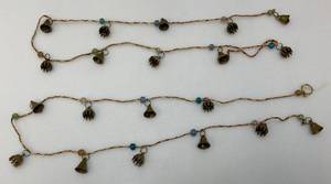 lot 107 image: Vintage Strand Of Miniature Brass Hanging Door Bells 82 Long