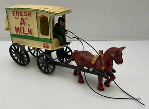 lot 153 image: Vintage Heavy Cast Metal Milk Wagon With Horse 6 x 11