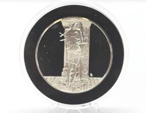 lot 11 image: 100 Greatest Masterpieces - Large Solid Sterling Silver Coin - St. Sebastian